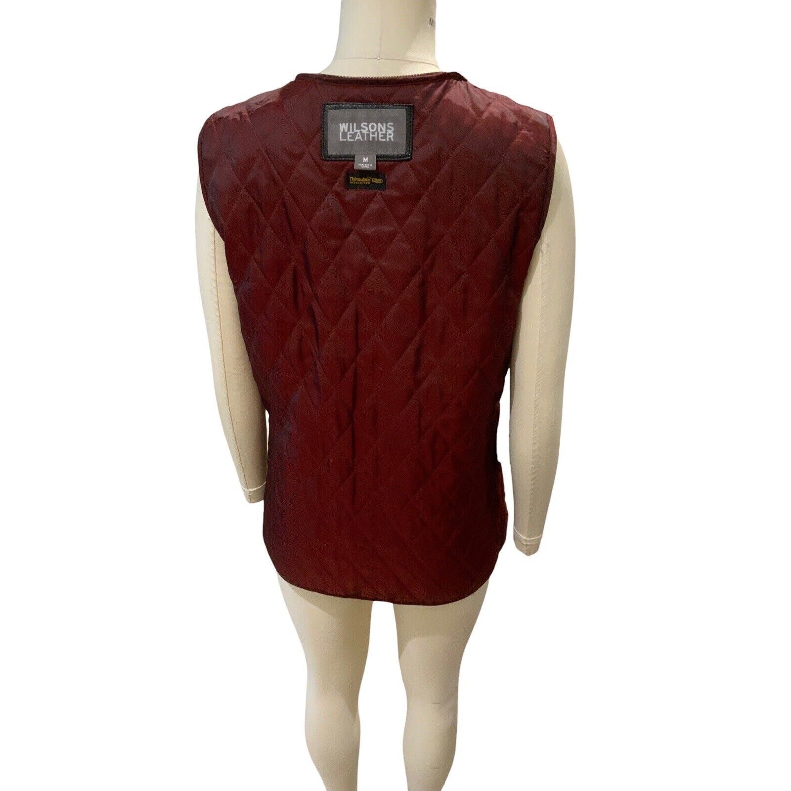 Back View Of Red Quilted Zip Out Lining Vest