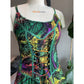 Closeup Of Front View Of Green Abstract Animal Print Corset Handkerchief Dress
