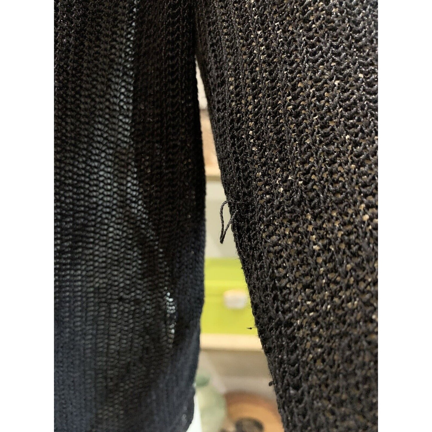 Loose Thread On Women's Black Knit Sweater 