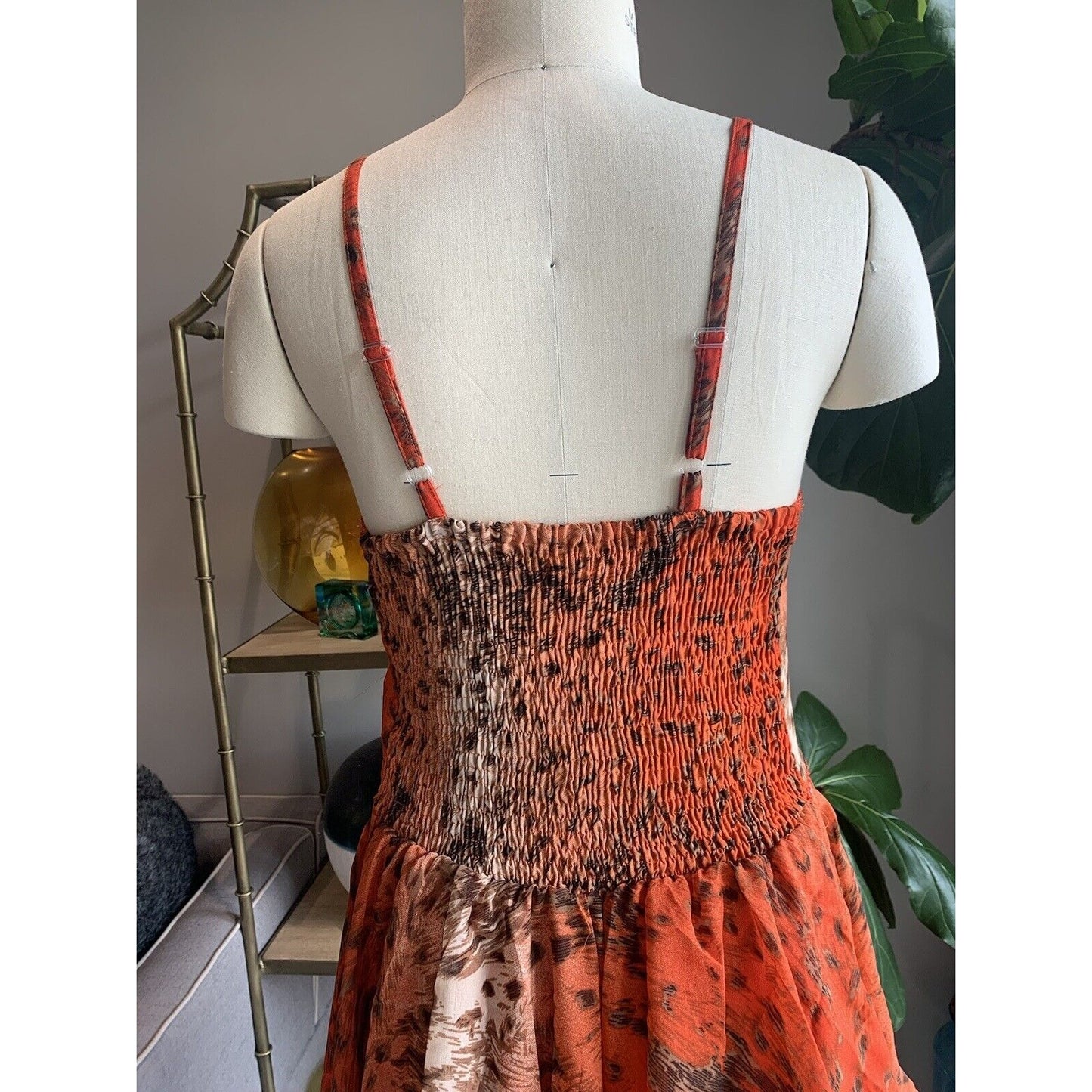 Closeup Of Rear Of Orange Abstract Animal Print Corset Handkerchief Dress