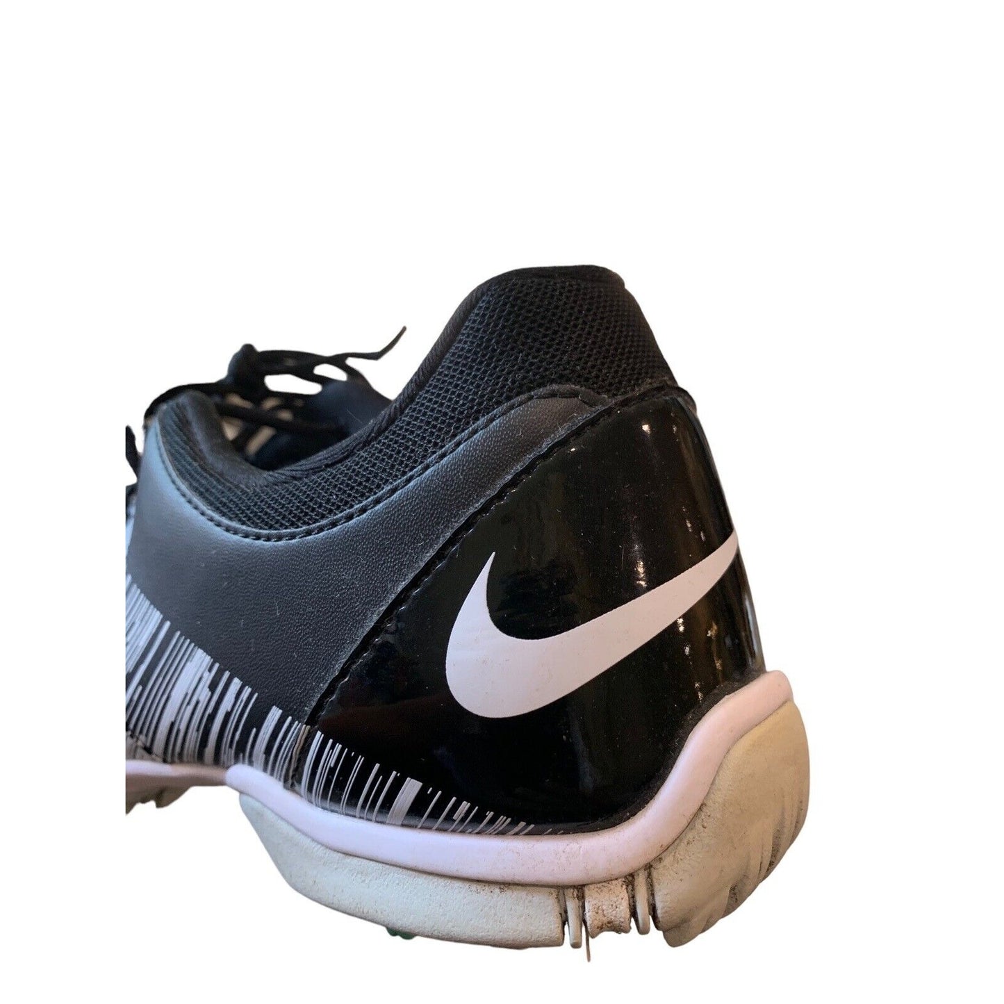 Heel View Of Black And White Women's Golf TAC Shoe