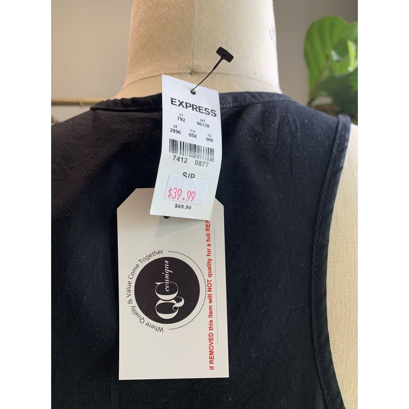 QC Consigns And Price Tags