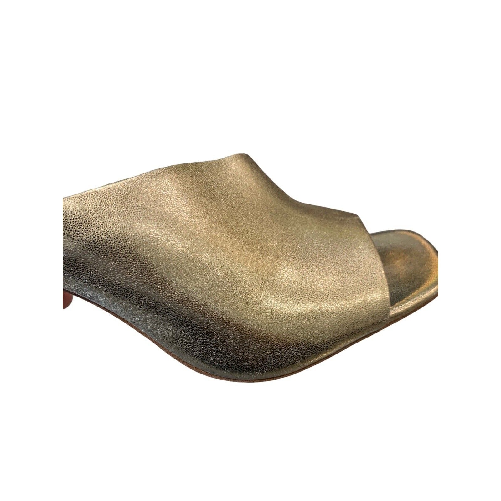 Closeup Of Light Gold Metallic Open-Toe Shoe