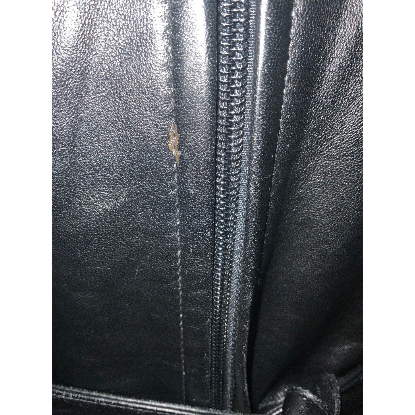Closeup Of Scuff Mark Next To Jacket Zipper