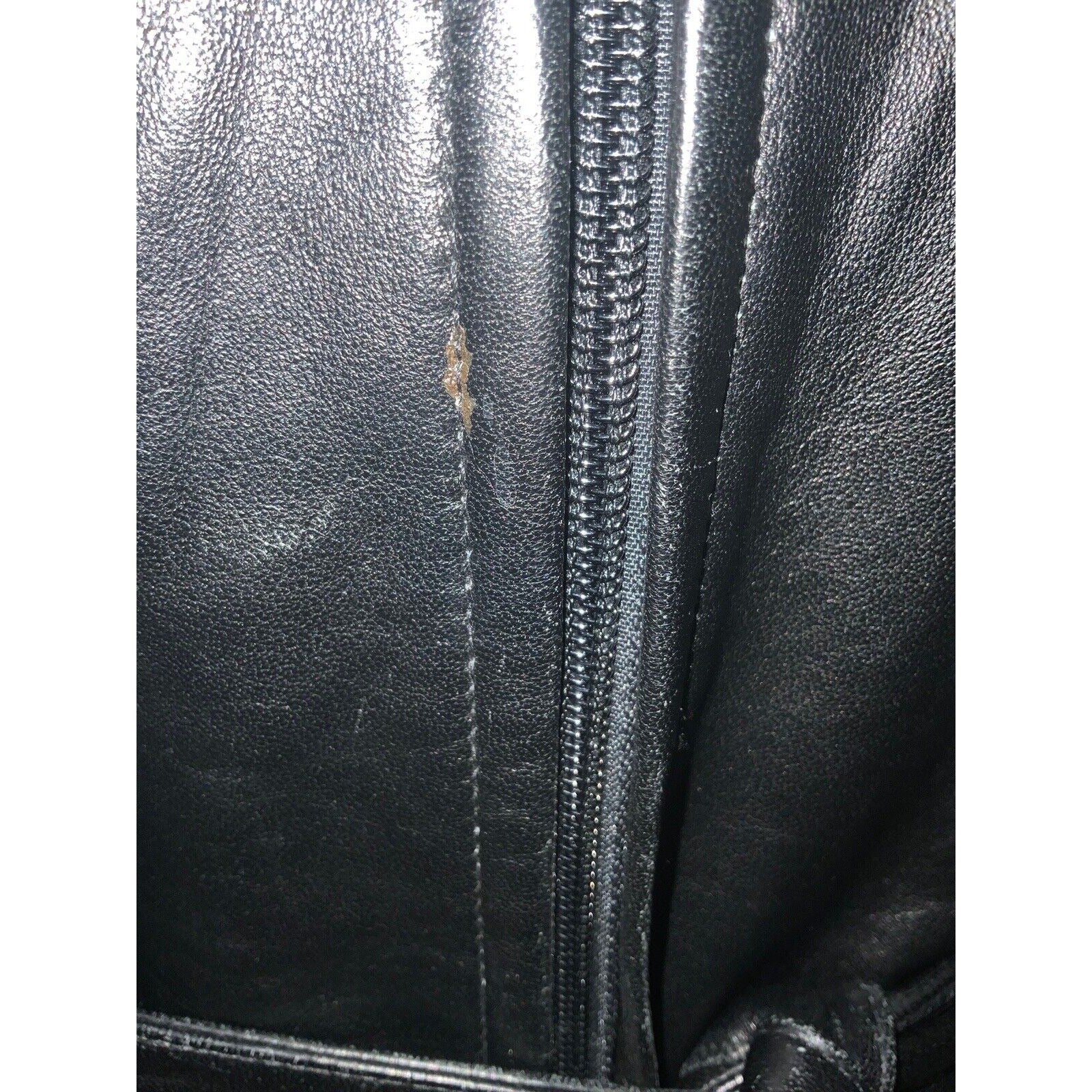 Closeup Of Scuff Mark Next To Jacket Zipper