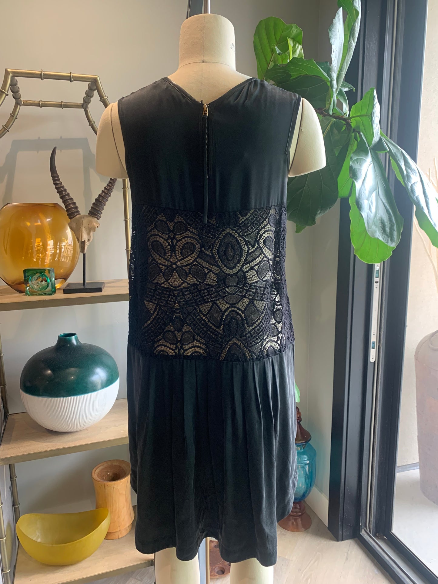 Rear View Of Black Sleeveless Dress