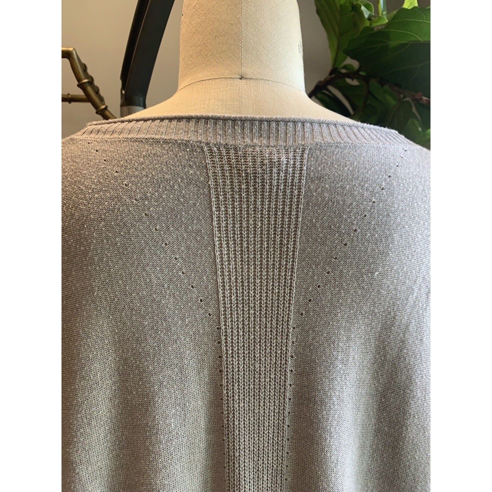 Closeup Of Rear View Of Women's Knit Tunic Sweater
