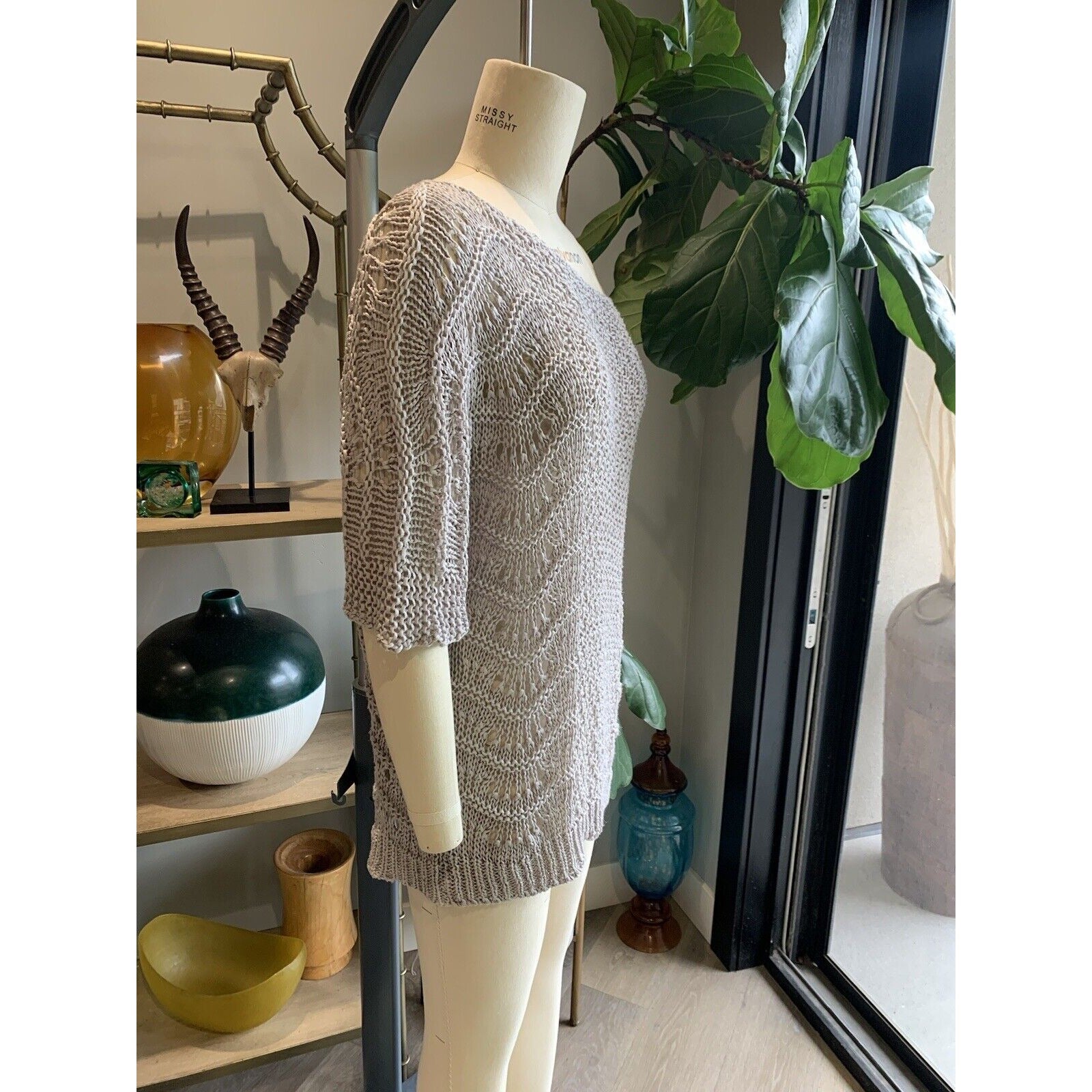 Sideview Of Women's Wide-Neck Fishnet Sweater