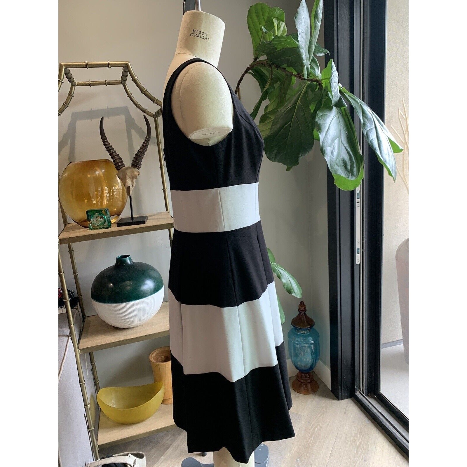 Side View Of Striped Black And White Block Flare Dress