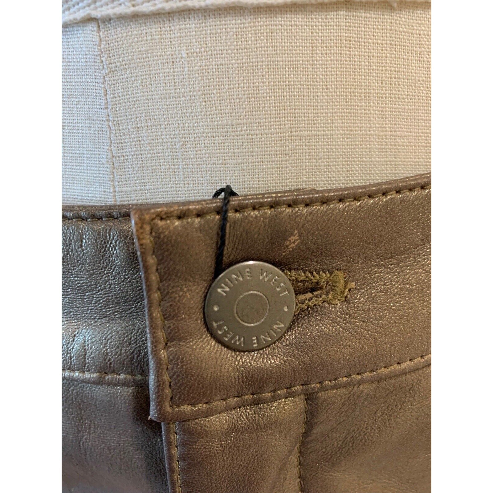 Closeup Of Button With Product Brand