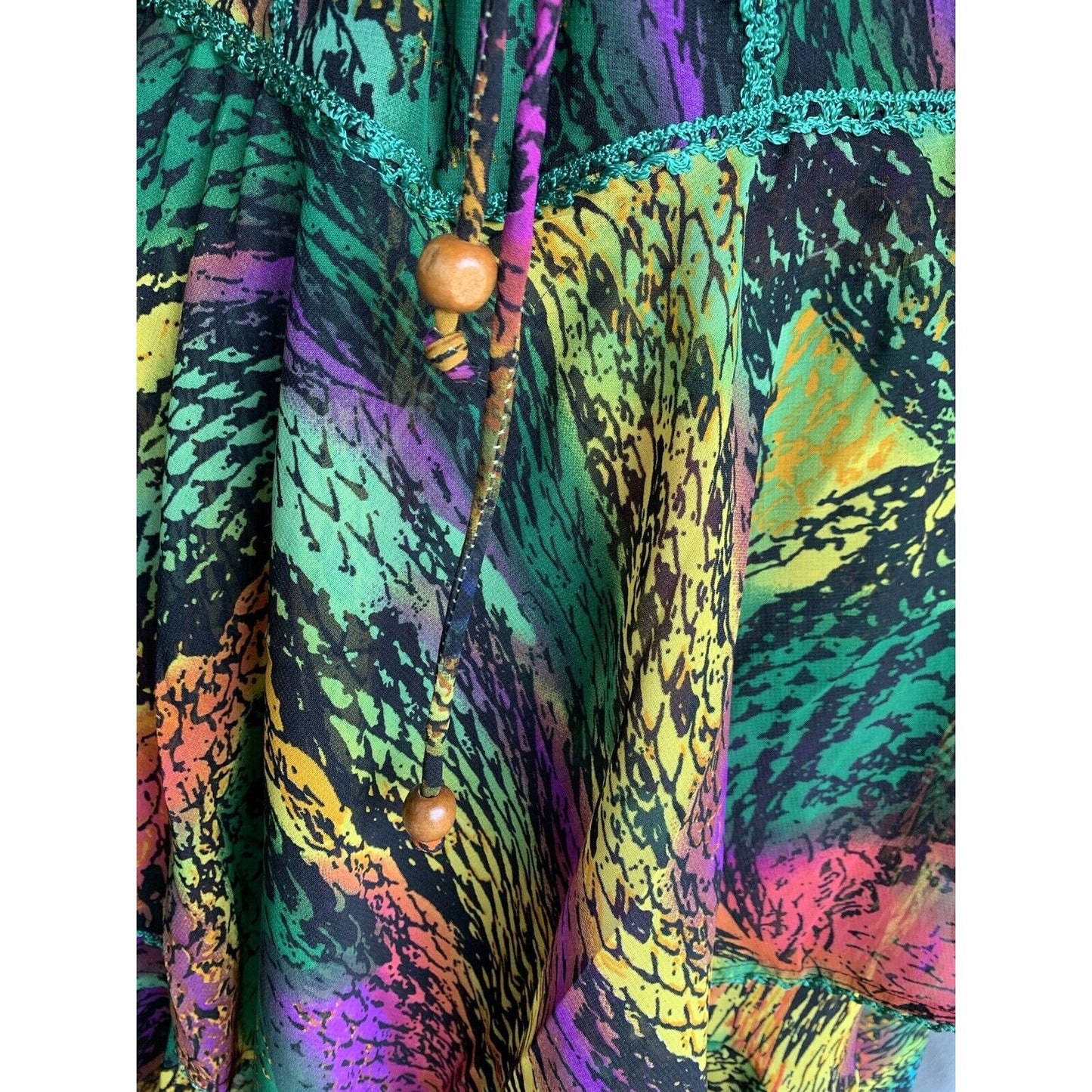Closeup Of Beads On Green Abstract Animal Print Corset Handkerchief Dress