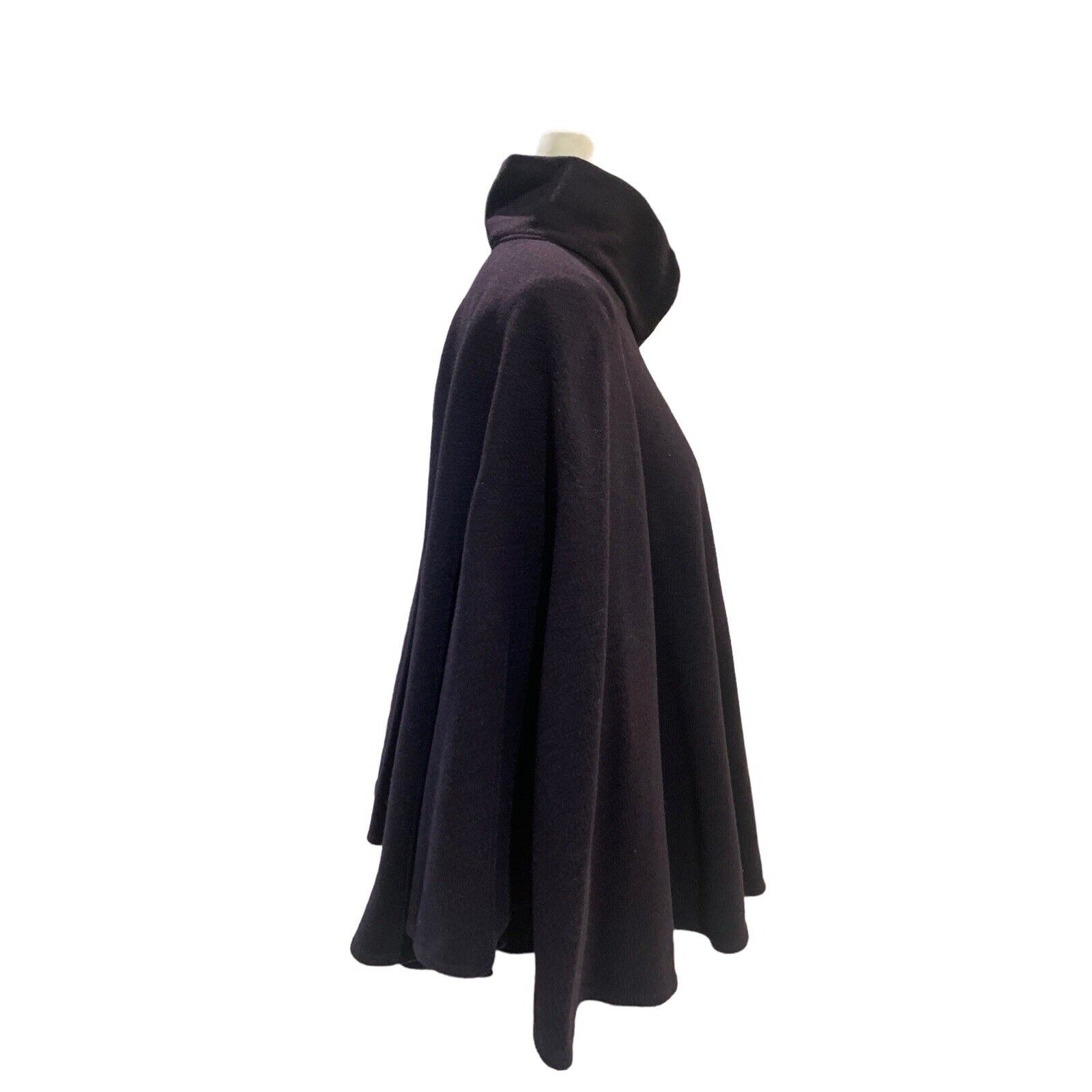 Side View Of Black High-Collar 3/4 Zip Cape