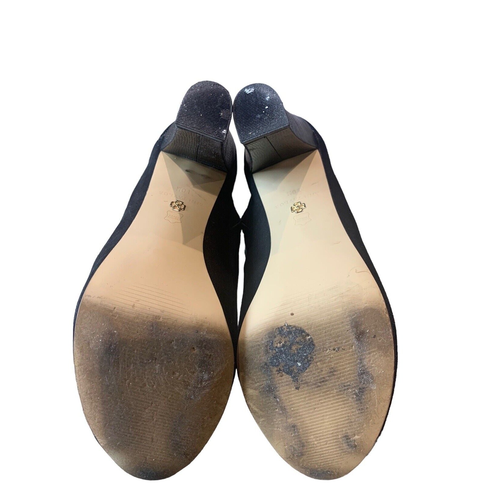 view of shoe soles on white background