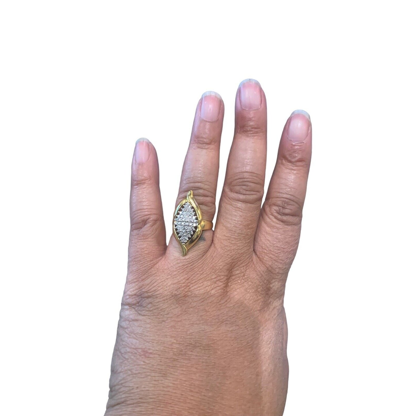 Image Of A Hand Wearing A 18k Gold Over Sterling Silver Diamond Accent Cluster Ring On White Background