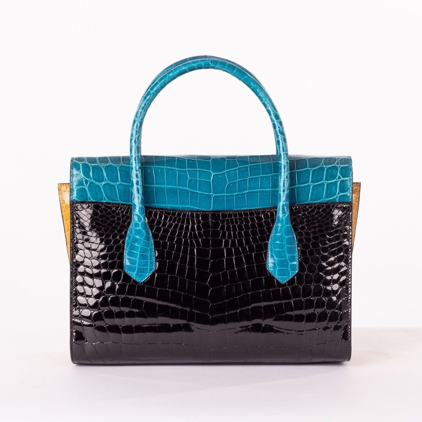 Rear View Of Blue and Black Color Block Crocodile Handbag