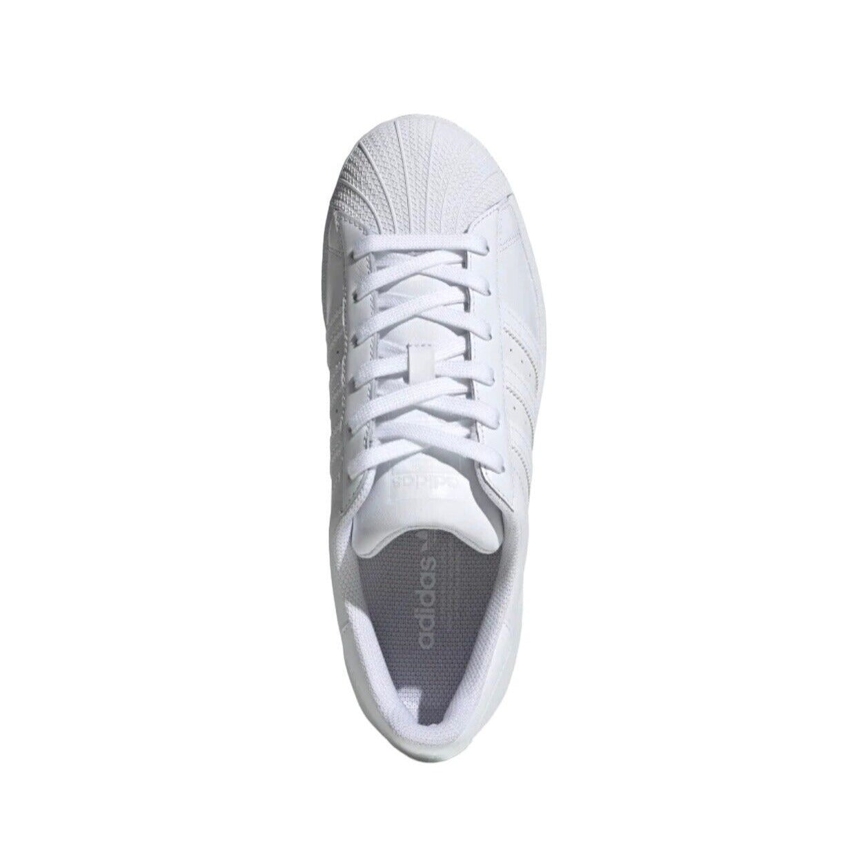 bird's eye view of top of white Adidas sneaker