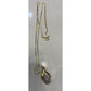 18 Karat Gold Over Sterling Silver Diamond Accent Necklace With A 9-1/2” Drop On A Gray Background