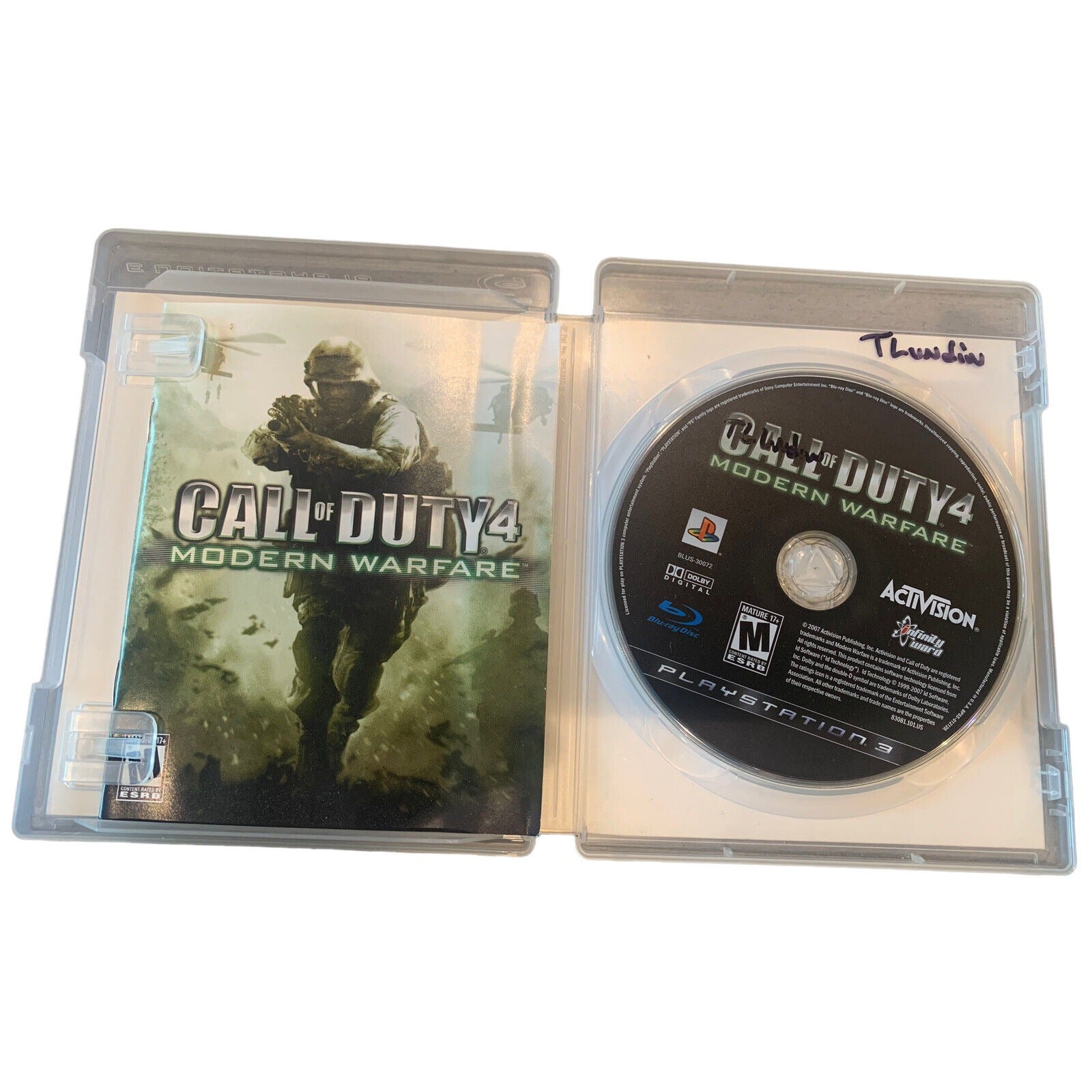 Call of Duty 4 Modern Warfare PlayStation 3 Disc And Sleeve Displayed In Open Case